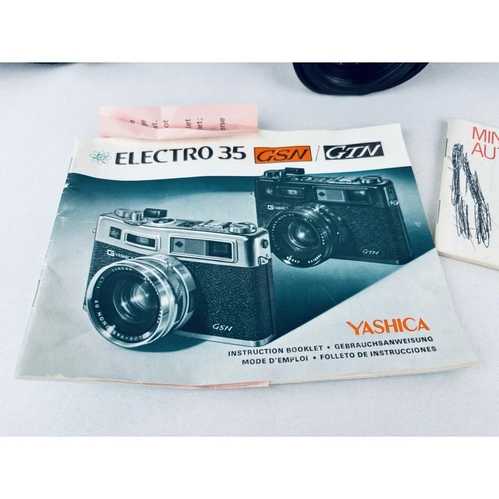 Yashica Vintage Electro 35 GSN Camera & Minolta Electroflash 28 & Film & Books